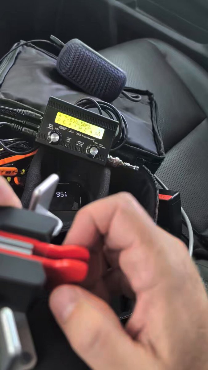 QRP Labs QMX transceiver and iambic paddle set up in the car for a lunchtime CW practice session