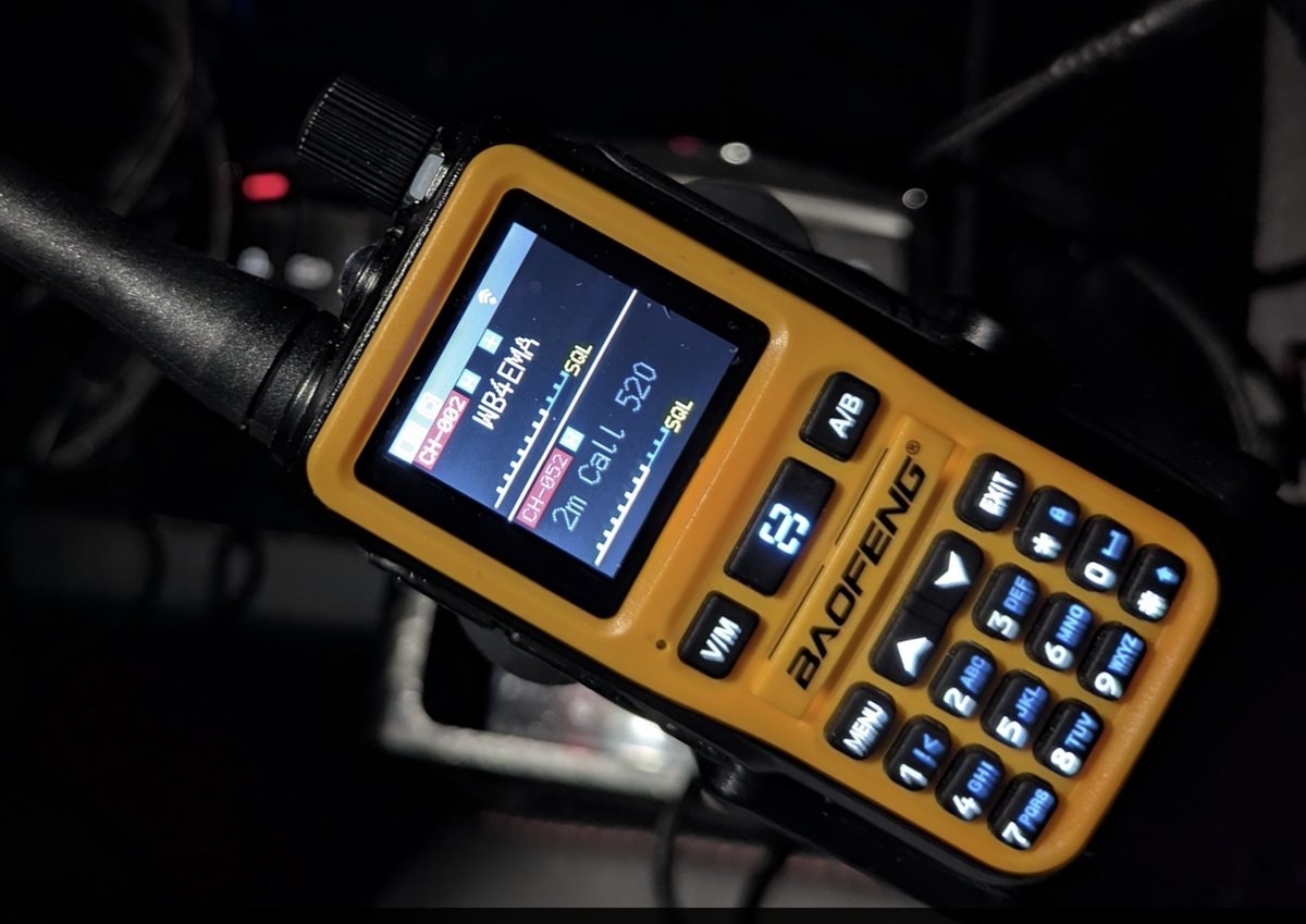 Baofeng Mini with VFO A (the top display) tuned to a local repeater frequency while monitoring 146.520 (the 2-meter FM simplex national calling frequency) on VFO B (the bottom display).